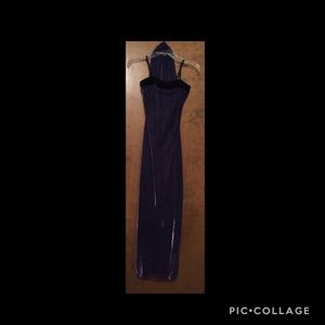 Purple & black dress with sash.
